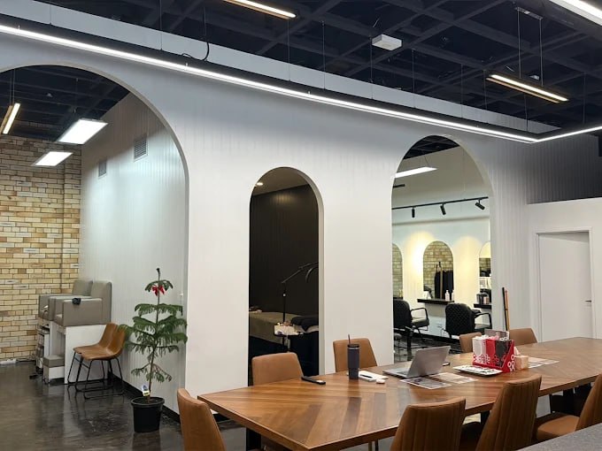 Seoul Glow Studio interior with arch mirrors and exposed brick